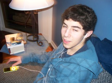 Me, circa 2010. May not be writing, but still plugged in. And apparently not ready for a photo...